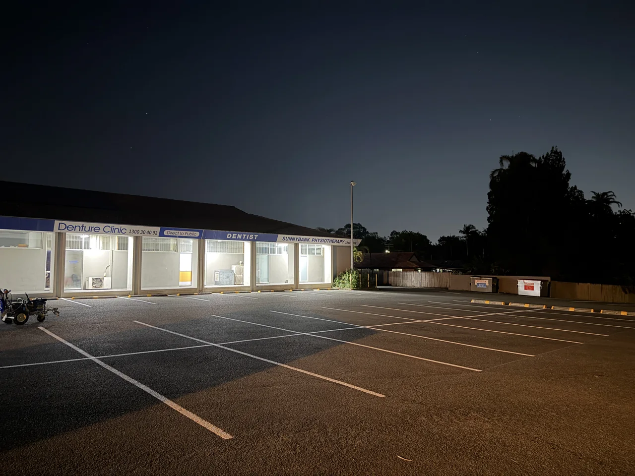Freshly installed parking bay lines in a commercial car park